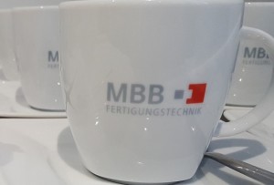AumannAG_Kaffeetasse_logoMBBFertigungstechnik